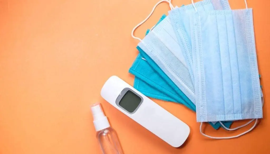 Covid essentials: face mask, alcohol, thermometer