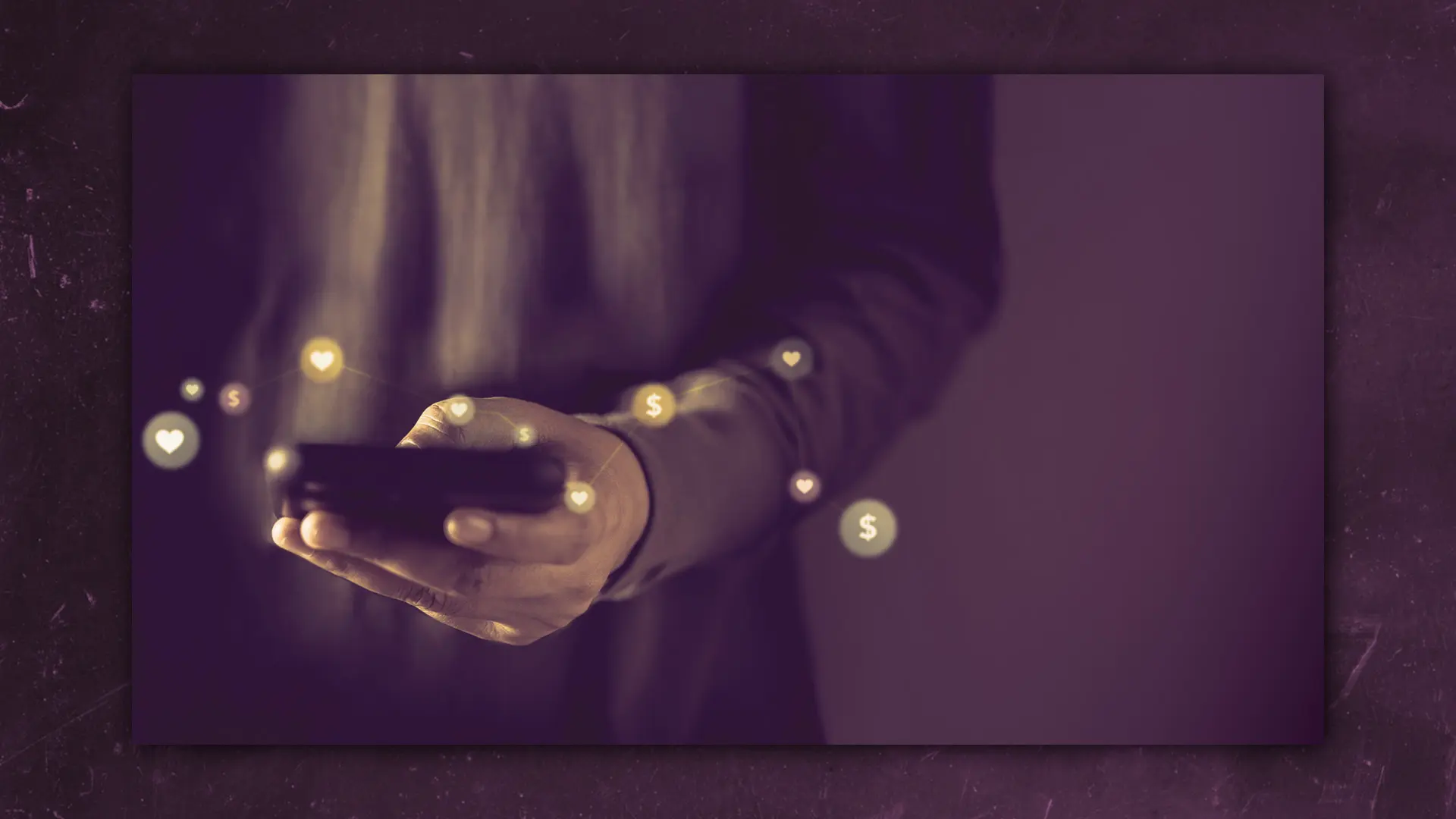 A hand holding a phone next to symbols of donations