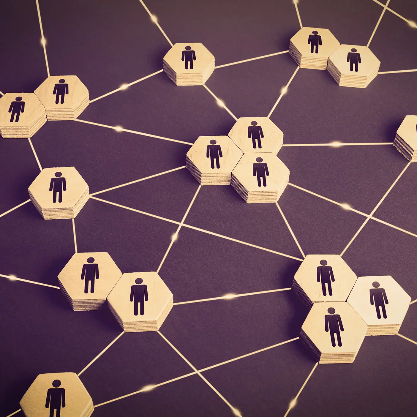 A branching network of interconnected human icons symbolizing the severe mental illness community