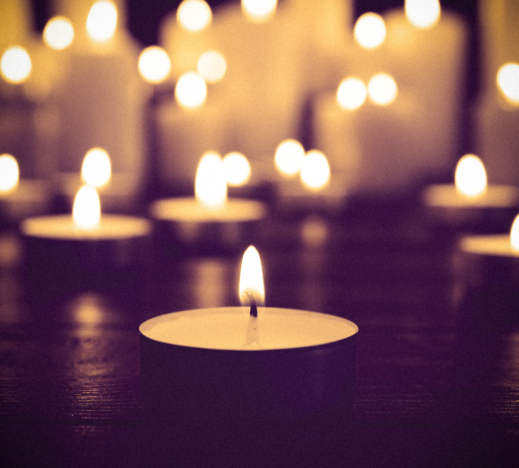 Solemn candles symbolizing the mortality associated with schizophrenia