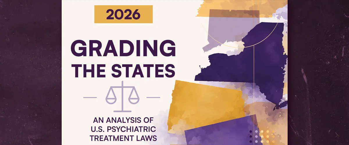 The cover of TAC's Grading The States report, showing some colored states referring to the quality of psychiatric treatment laws.